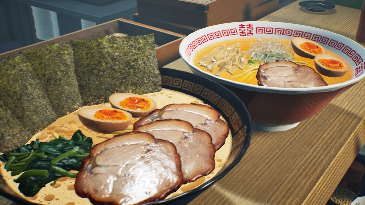 A plate of chashu, halved eggs, and nori beside a bowl of ramen on a wooden table.